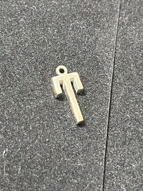 Sterling silver metallic charm
Chai symbol, Hebrew word for "life"
Or Letter T